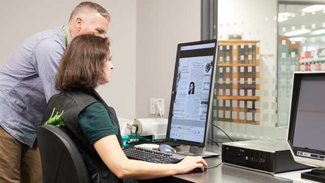 Two people at computer