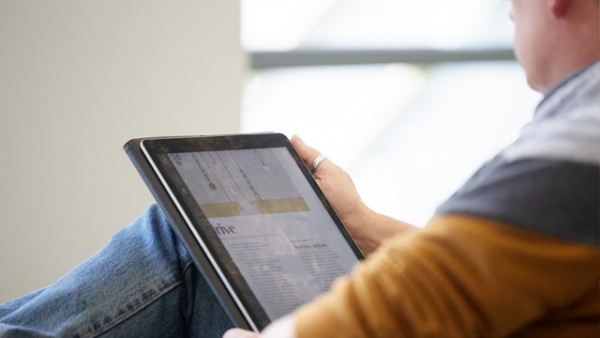 Man reading on iPad